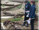 Kirsty and Jo feeding the Otters' windows