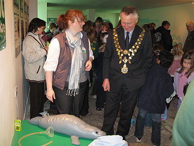 Sarah Vine, the Sanctuary's Attraction Manager and the Mayor of Helston look at the interactive rescue volunteer section