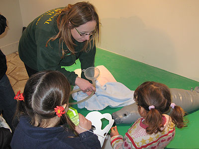 Rachael Vine demonstrates how to be a rescue volunteer