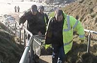 Karl Wheston and Simon Bone takes Tanglefoot from beach up the footpath in the cage  - Photo was taken by Sue Sayer on 14-01-2006